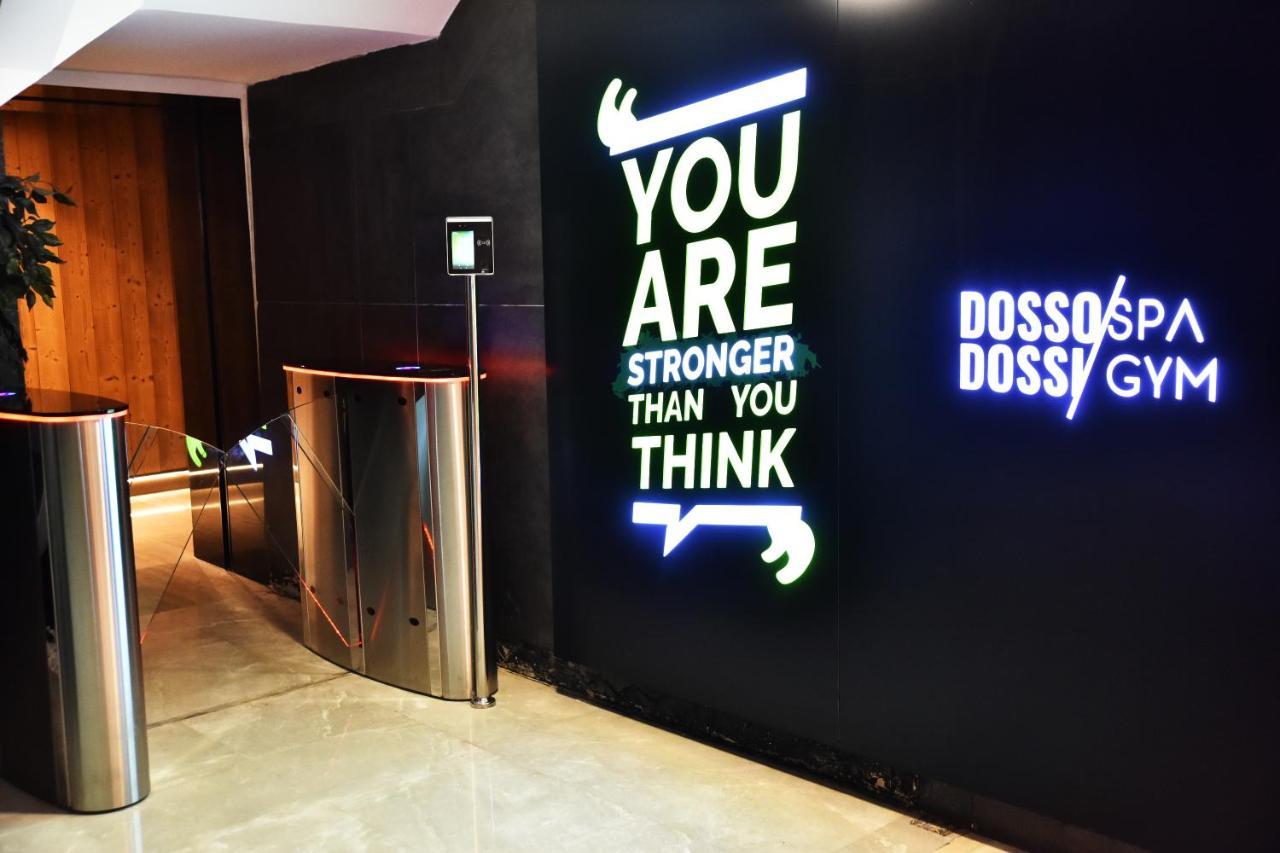 Dosso Dossi Hotels & Spa Downtown Istambul Exterior foto The photo shows an entrance area with a modern design, featuring a wall with motivational text that reads "YOU ARE STRONGER THAN YOU THINK." This text is visually striking and designed to encourage individuals. On the adjacent wall, there is a sign t