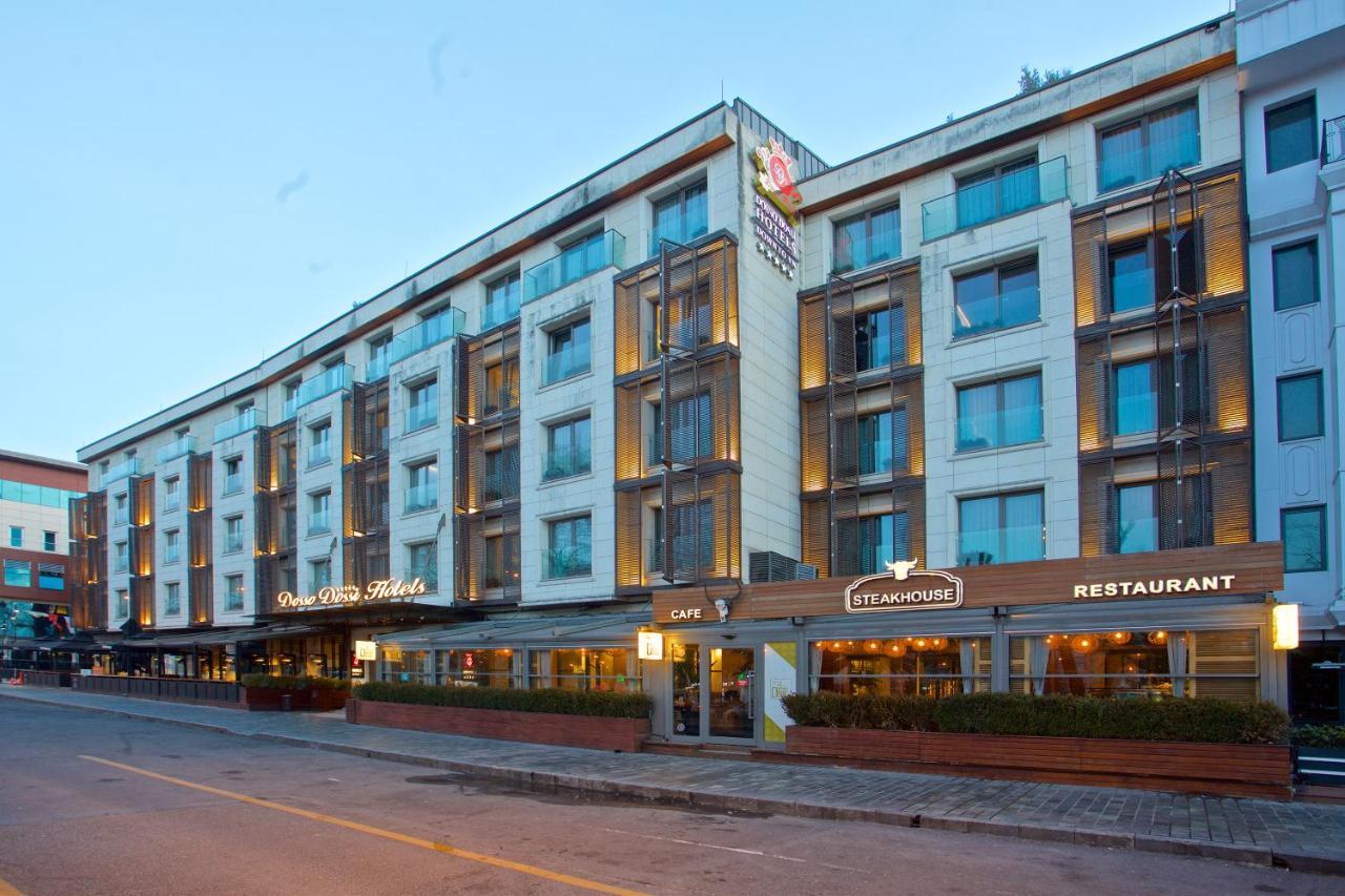 Dosso Dossi Hotels & Spa Downtown Istambul Exterior foto The photo shows a modern hotel building with multiple stories. The façade features a mix of glass and concrete elements, giving it a sleek and contemporary look. There are several large windows across the building, allowing for plenty of natural ligh